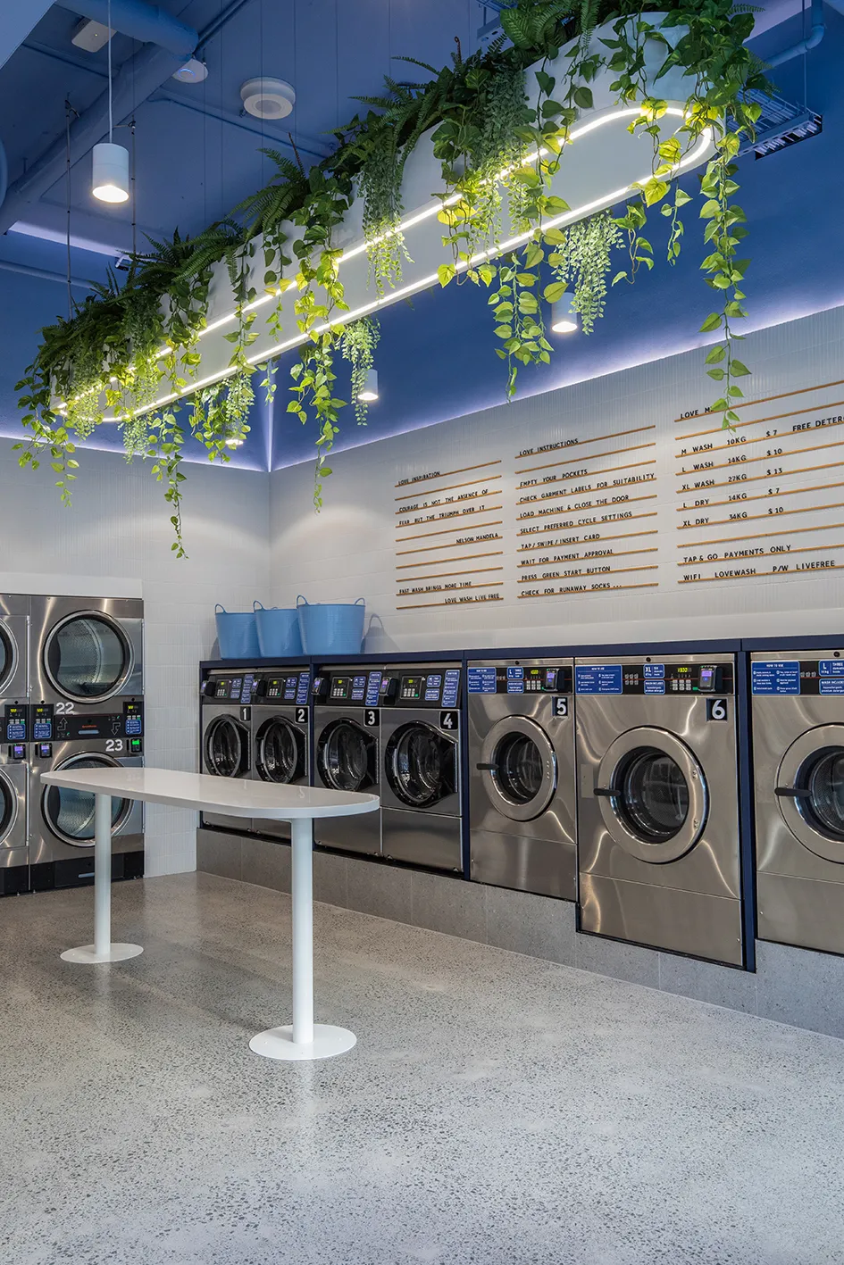 Modern laundromat interior Love Wash Mascot